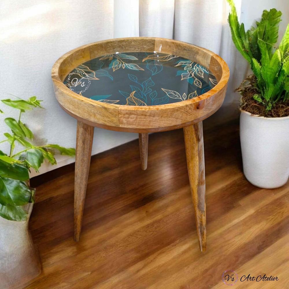 Two-tier wooden end table beside recliner chair