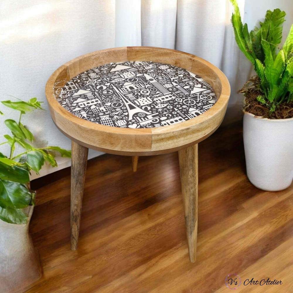 Corner side tables with indoor plants and decor
