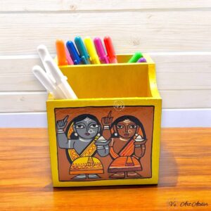 A vibrant ceramic handmade pen stands with a unique glaze, adding a pop of color to a desk.