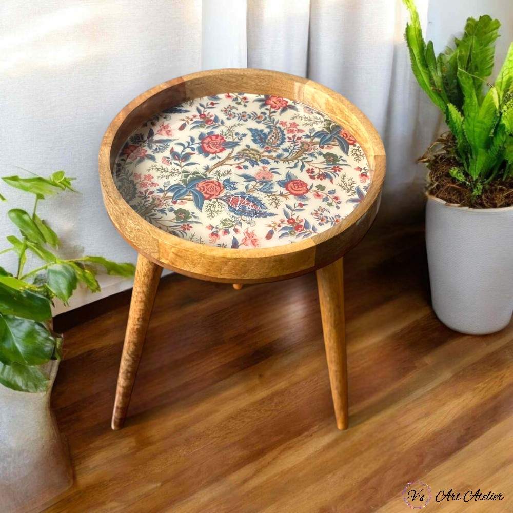 Oval coffee table paired with poufs and rug
