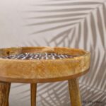 Corner table dining room setup with centerpiece