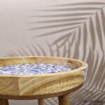 Rustic mango wood side table with texture