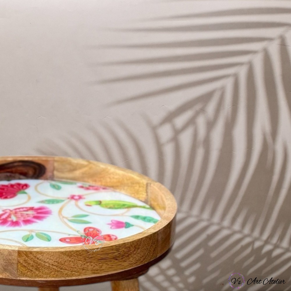 Round foyer table with floral arrangement