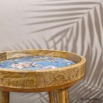 End table beside reading chair and floor lamp