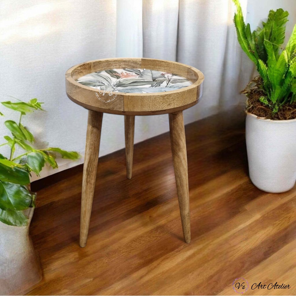 Side table with drawer, lamp, and framed photo