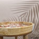 Rustic side table beside country-style sofa