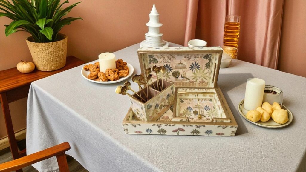 An elegant, dark wood **rectangular tray** holding a coffee mug, a small vase with flowers, and a book on a bed, suggesting a cozy morning.