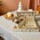An elegant, dark wood **rectangular tray** holding a coffee mug, a small vase with flowers, and a book on a bed, suggesting a cozy morning.